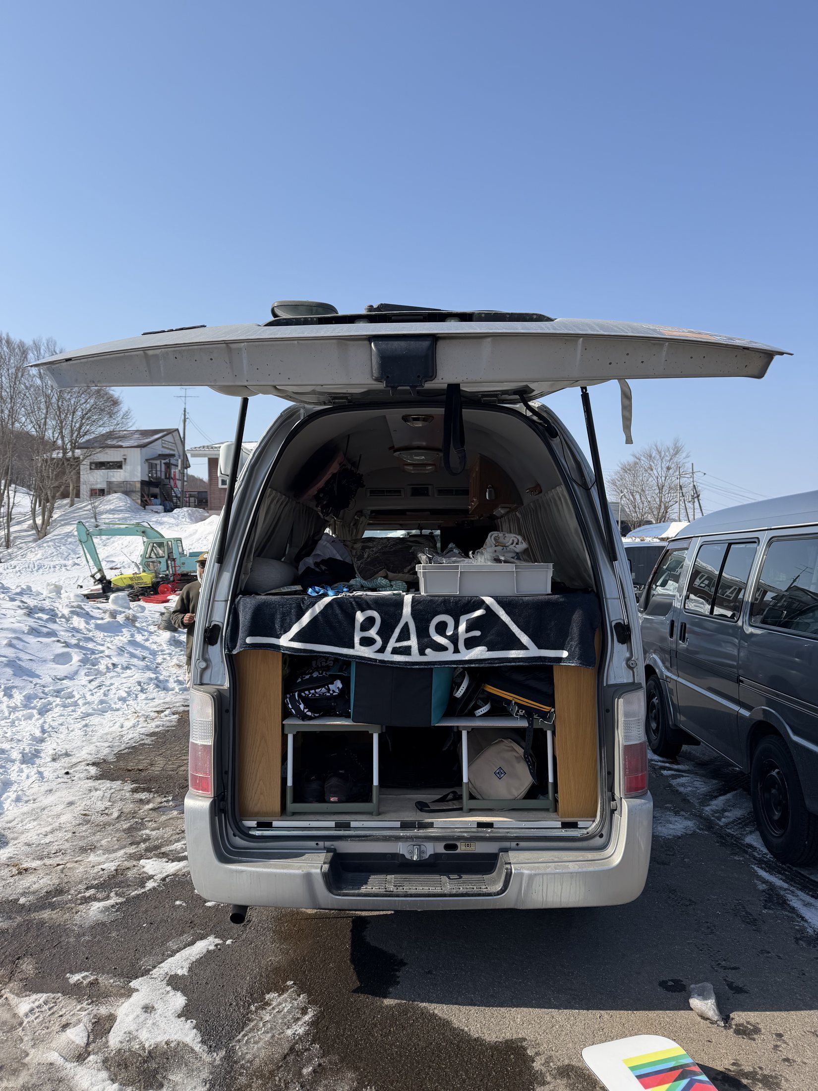 KM4K basecamp van packed with snow gear