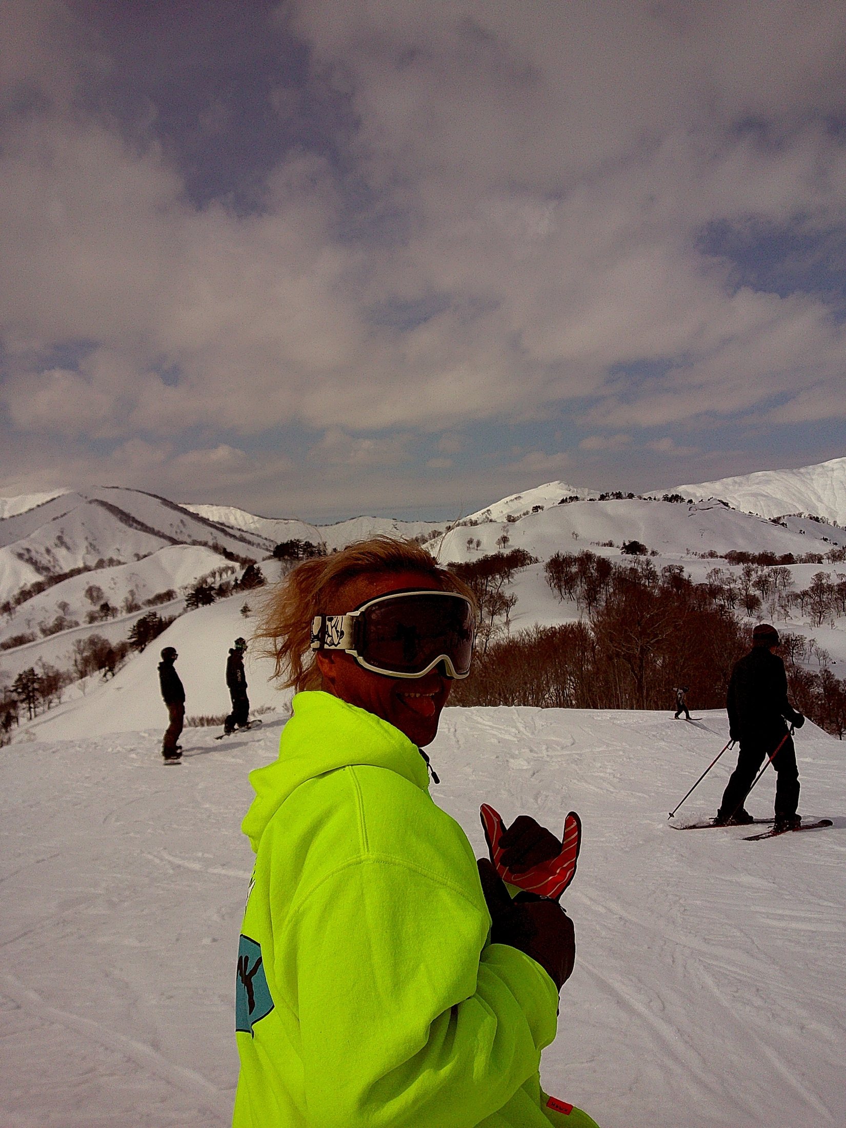 Rider in bright outerwear at a snowy resort